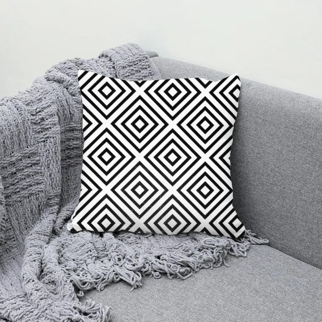 Black and white diamond pattern rendered on a pillow mockup